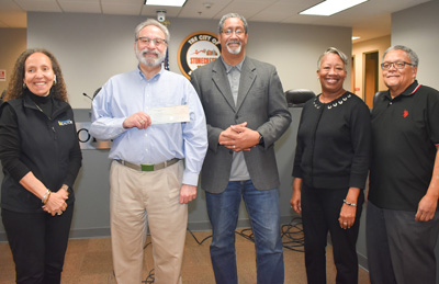 City Receives First Checks for New Developments